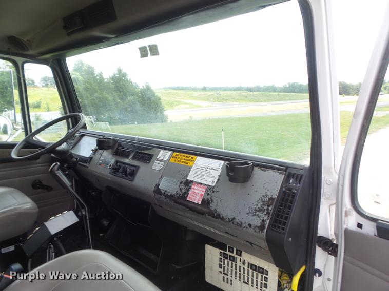 image for item DD7232 2005 Freightliner FL80 Crew Cab flatbed truck