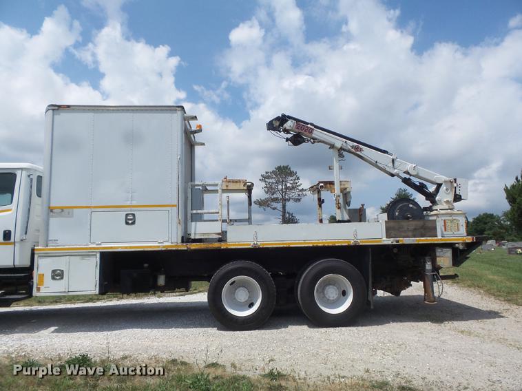 image for item DD7232 2005 Freightliner FL80 Crew Cab flatbed truck