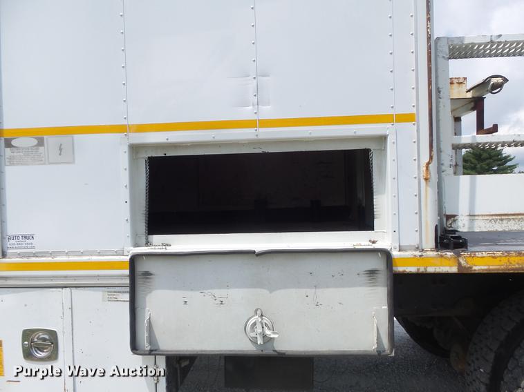 image for item DD7232 2005 Freightliner FL80 Crew Cab flatbed truck