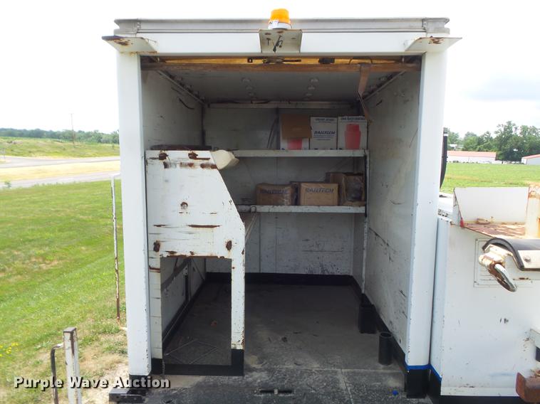 image for item DD7232 2005 Freightliner FL80 Crew Cab flatbed truck