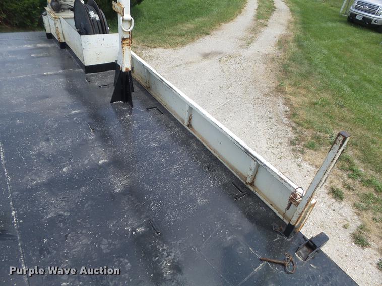 image for item DD7232 2005 Freightliner FL80 Crew Cab flatbed truck