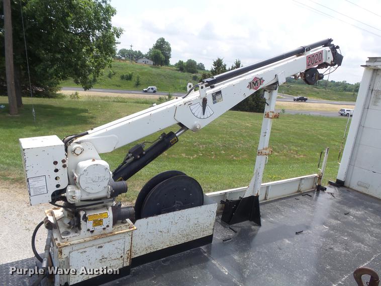 image for item DD7232 2005 Freightliner FL80 Crew Cab flatbed truck