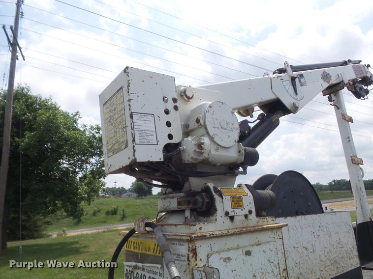 image for item DD7232 2005 Freightliner FL80 Crew Cab flatbed truck