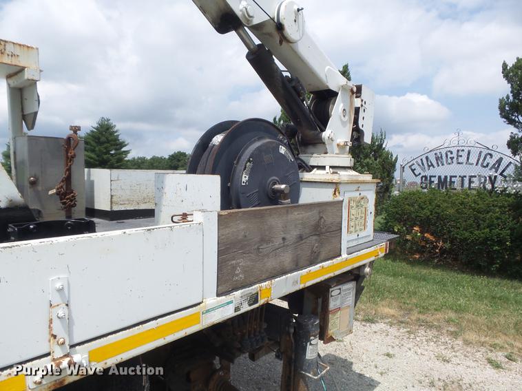 image for item DD7232 2005 Freightliner FL80 Crew Cab flatbed truck