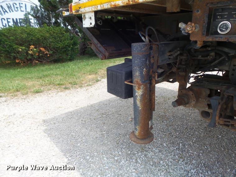 image for item DD7232 2005 Freightliner FL80 Crew Cab flatbed truck