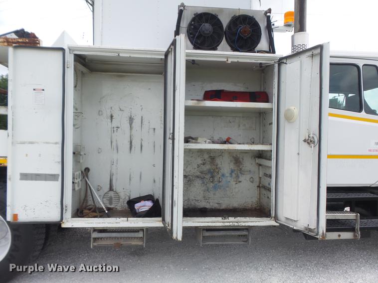 image for item DD7232 2005 Freightliner FL80 Crew Cab flatbed truck