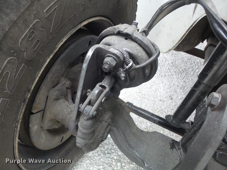 image for item DD7232 2005 Freightliner FL80 Crew Cab flatbed truck