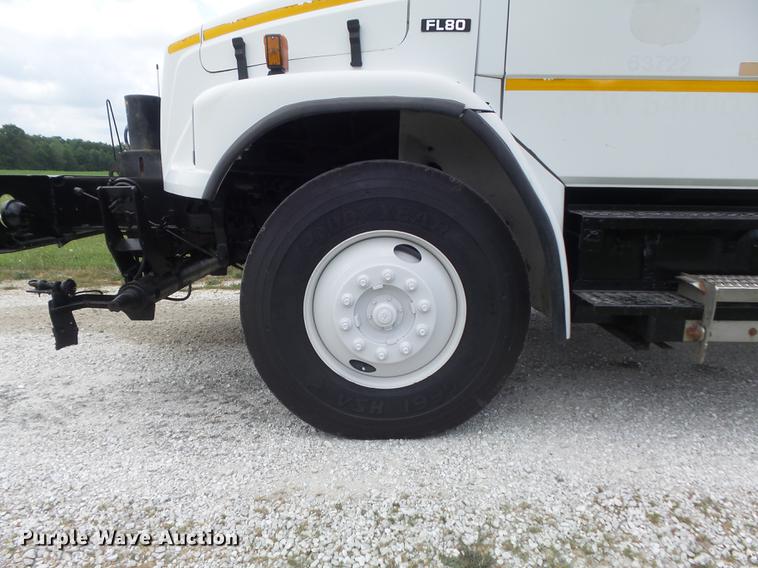 image for item DD7232 2005 Freightliner FL80 Crew Cab flatbed truck