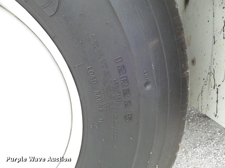 image for item DD7232 2005 Freightliner FL80 Crew Cab flatbed truck