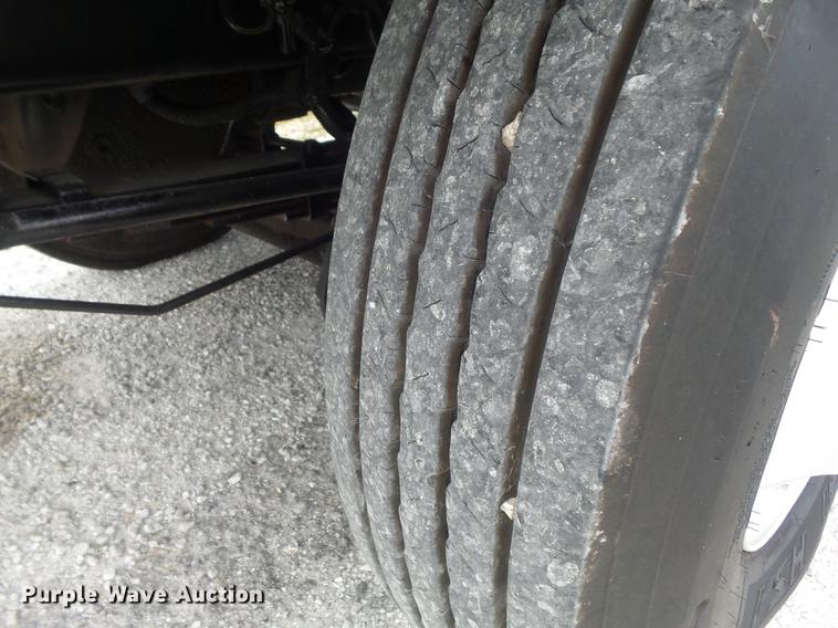 image for item DD7232 2005 Freightliner FL80 Crew Cab flatbed truck