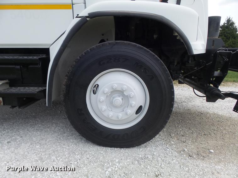 image for item DD7232 2005 Freightliner FL80 Crew Cab flatbed truck