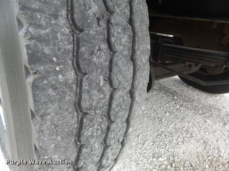 image for item DD7232 2005 Freightliner FL80 Crew Cab flatbed truck