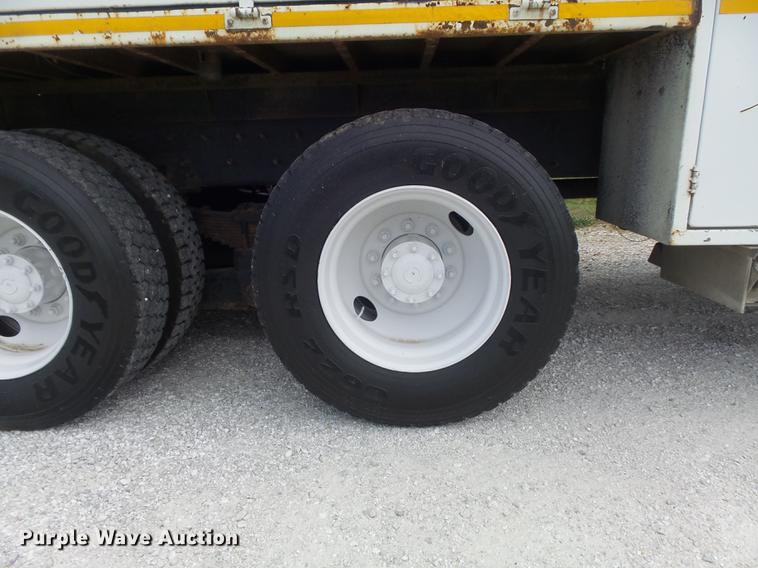 image for item DD7232 2005 Freightliner FL80 Crew Cab flatbed truck