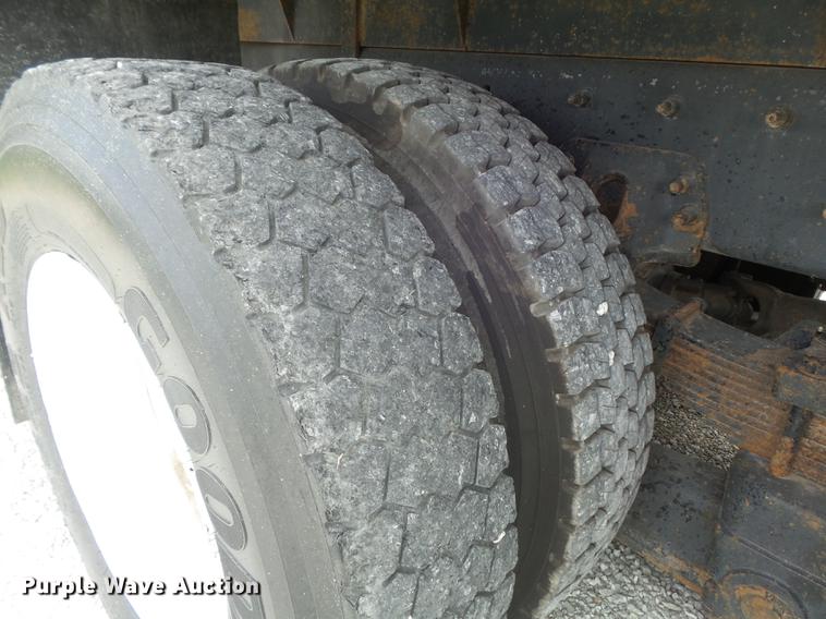 image for item DD7232 2005 Freightliner FL80 Crew Cab flatbed truck