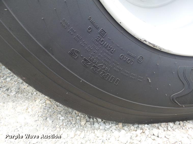 image for item DD7232 2005 Freightliner FL80 Crew Cab flatbed truck