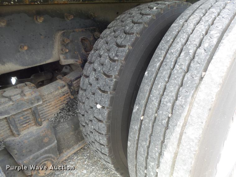 image for item DD7232 2005 Freightliner FL80 Crew Cab flatbed truck