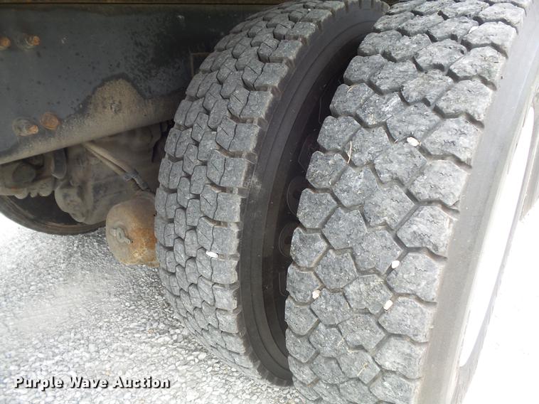 image for item DD7232 2005 Freightliner FL80 Crew Cab flatbed truck