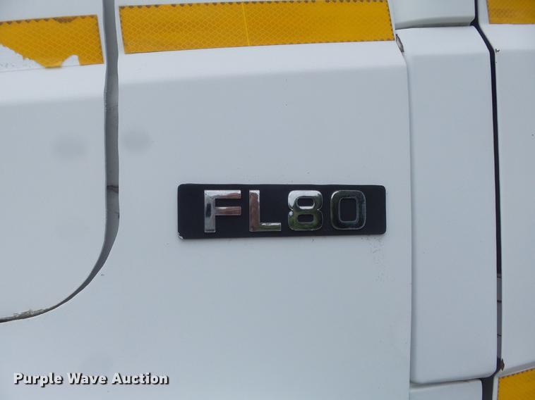 image for item DD7232 2005 Freightliner FL80 Crew Cab flatbed truck
