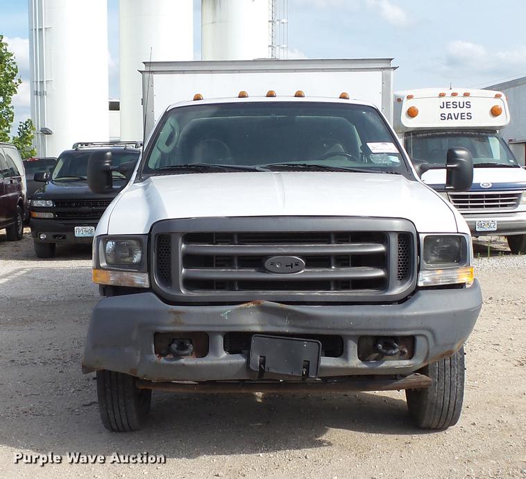 image for item DD7285 2003 Ford F450 Super Duty XL Crew Cab dump flatbed pickup truck