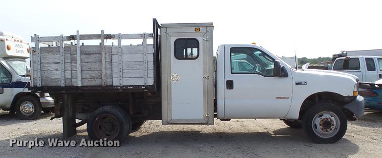 image for item DD7285 2003 Ford F450 Super Duty XL Crew Cab dump flatbed pickup truck