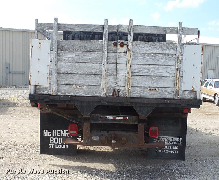 image for item DD7285 2003 Ford F450 Super Duty XL Crew Cab dump flatbed pickup truck