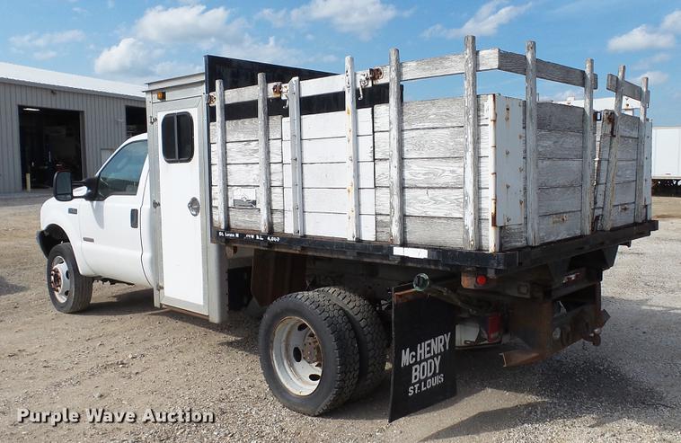 image for item DD7285 2003 Ford F450 Super Duty XL Crew Cab dump flatbed pickup truck