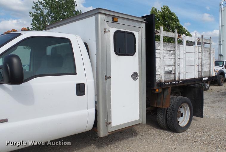 image for item DD7285 2003 Ford F450 Super Duty XL Crew Cab dump flatbed pickup truck