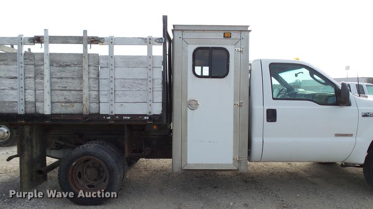 image for item DD7285 2003 Ford F450 Super Duty XL Crew Cab dump flatbed pickup truck