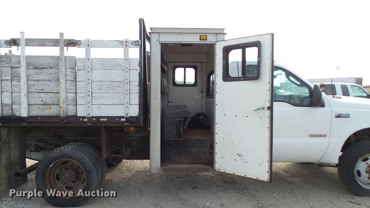 image for item DD7285 2003 Ford F450 Super Duty XL Crew Cab dump flatbed pickup truck