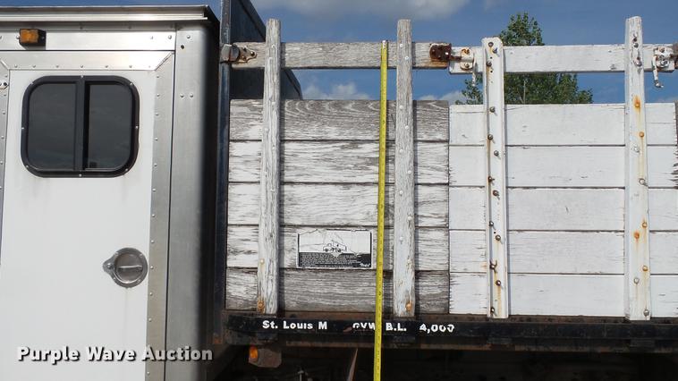 image for item DD7285 2003 Ford F450 Super Duty XL Crew Cab dump flatbed pickup truck