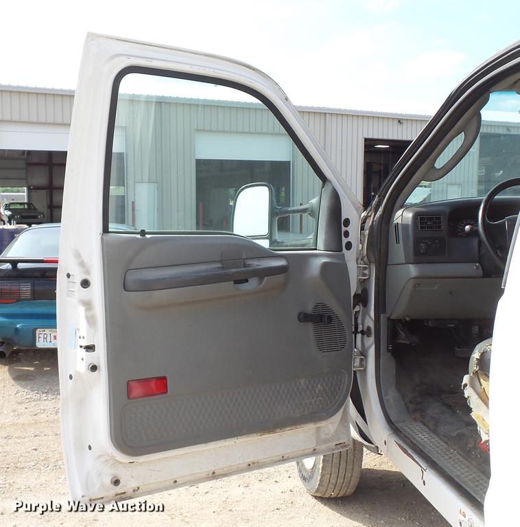 image for item DD7285 2003 Ford F450 Super Duty XL Crew Cab dump flatbed pickup truck