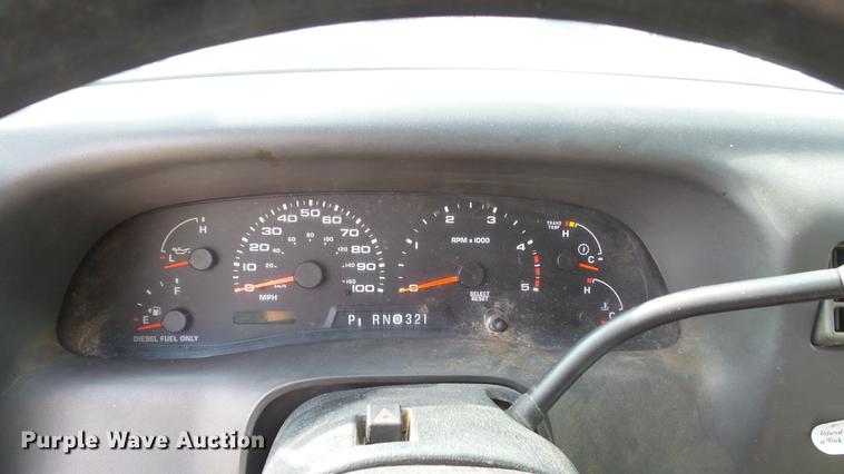 image for item DD7285 2003 Ford F450 Super Duty XL Crew Cab dump flatbed pickup truck