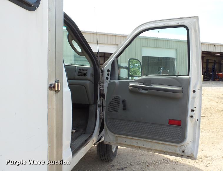 image for item DD7285 2003 Ford F450 Super Duty XL Crew Cab dump flatbed pickup truck