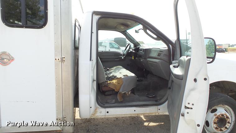 image for item DD7285 2003 Ford F450 Super Duty XL Crew Cab dump flatbed pickup truck