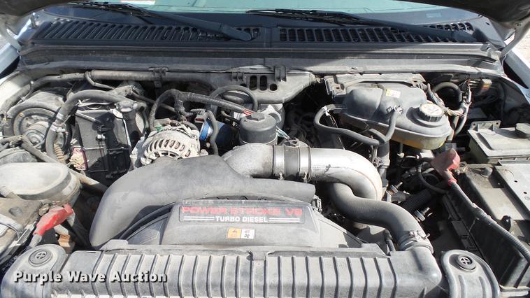 image for item DD7285 2003 Ford F450 Super Duty XL Crew Cab dump flatbed pickup truck