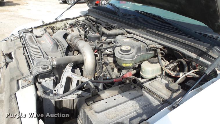 image for item DD7285 2003 Ford F450 Super Duty XL Crew Cab dump flatbed pickup truck