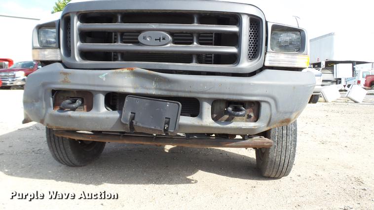 image for item DD7285 2003 Ford F450 Super Duty XL Crew Cab dump flatbed pickup truck