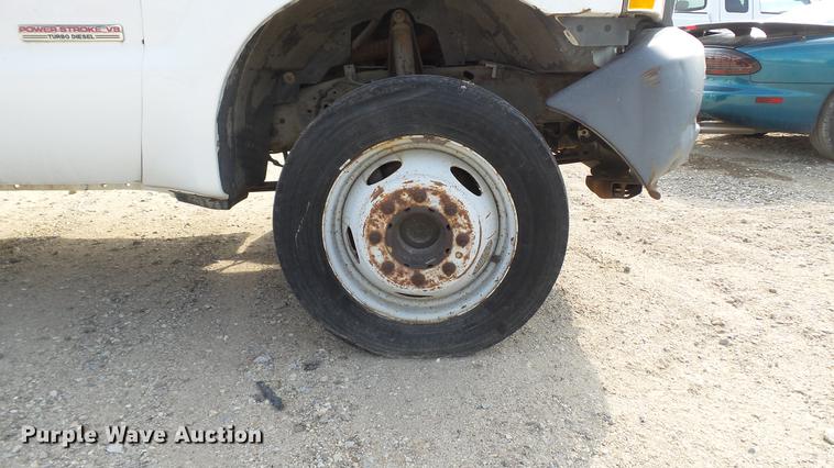 image for item DD7285 2003 Ford F450 Super Duty XL Crew Cab dump flatbed pickup truck