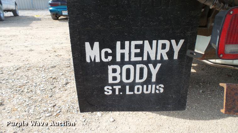 image for item DD7285 2003 Ford F450 Super Duty XL Crew Cab dump flatbed pickup truck