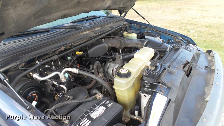 image for item DD7337 2001 Ford F250 Super Duty XL Crew Cab utility bed pickup truck