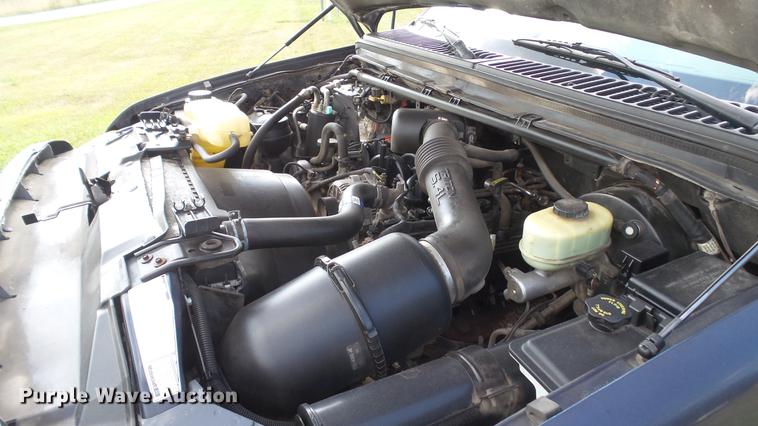 image for item DD7337 2001 Ford F250 Super Duty XL Crew Cab utility bed pickup truck