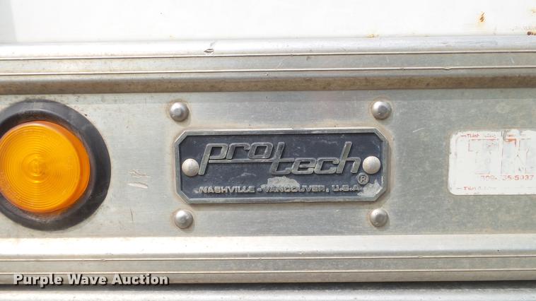 image for item DD7353 2003 Ford F550 Super Duty XL Crew Cab flatbed truck