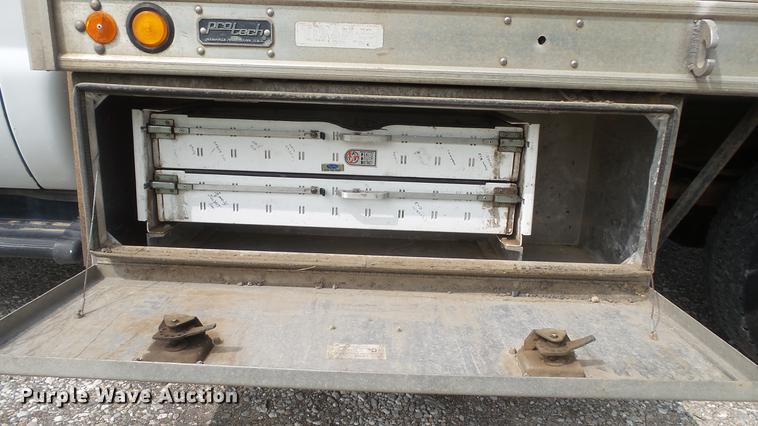 image for item DD7353 2003 Ford F550 Super Duty XL Crew Cab flatbed truck