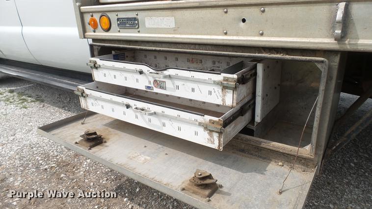 image for item DD7353 2003 Ford F550 Super Duty XL Crew Cab flatbed truck