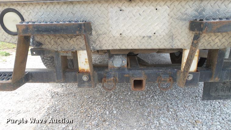 image for item DD7353 2003 Ford F550 Super Duty XL Crew Cab flatbed truck