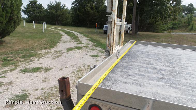 image for item DD7353 2003 Ford F550 Super Duty XL Crew Cab flatbed truck