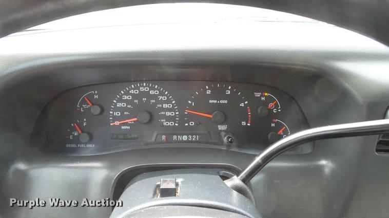 image for item DD7353 2003 Ford F550 Super Duty XL Crew Cab flatbed truck