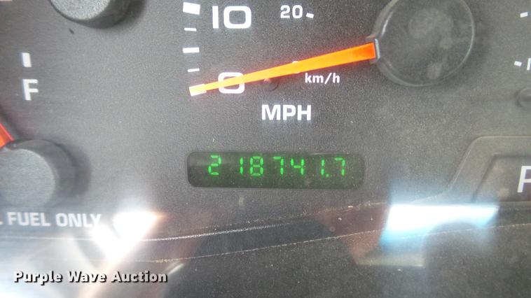 image for item DD7353 2003 Ford F550 Super Duty XL Crew Cab flatbed truck