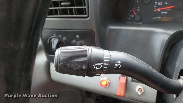 image for item DD7353 2003 Ford F550 Super Duty XL Crew Cab flatbed truck