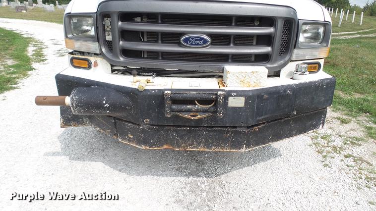 image for item DD7353 2003 Ford F550 Super Duty XL Crew Cab flatbed truck